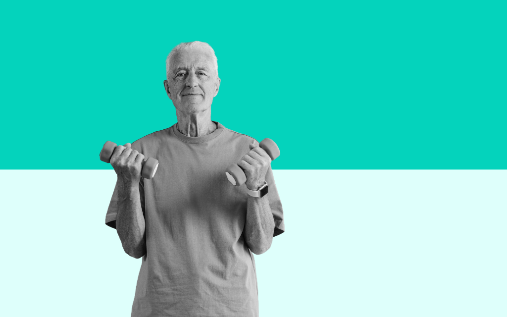 Older man weight training in a leisure centre as part of an exercise referral programme for health and wellbeing